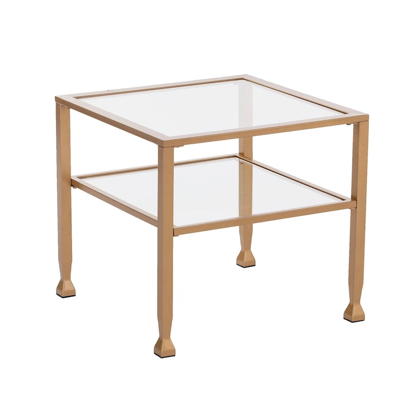 Table basse en métal doré et plateau en verre