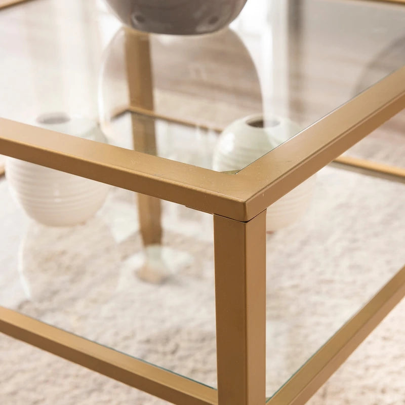 Table basse en métal doré et plateau en verre