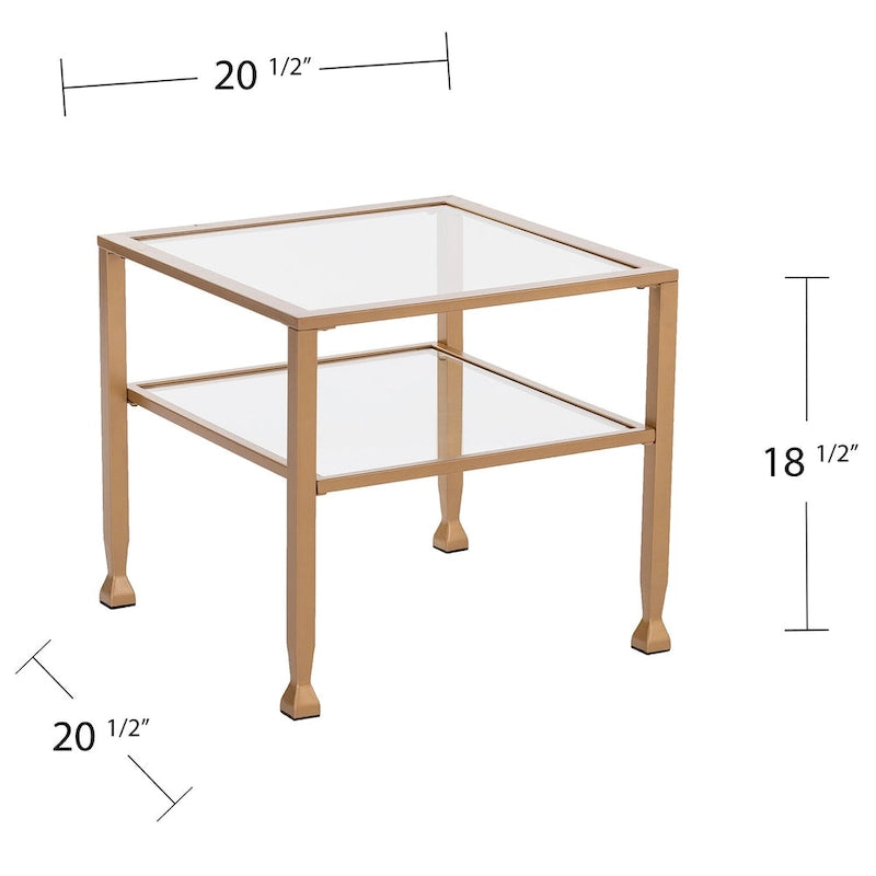 Table basse en métal doré et plateau en verre